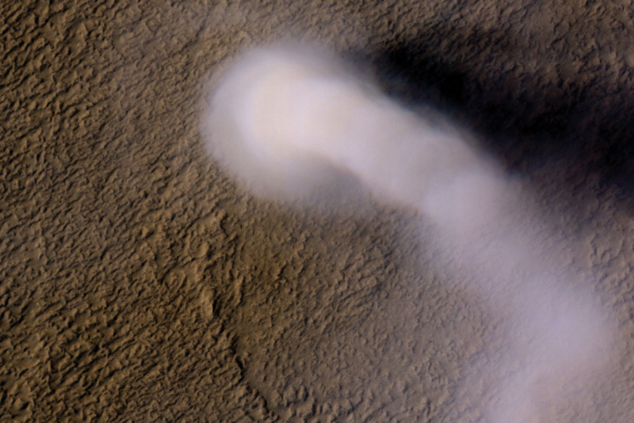 
       A Martian dust devil roughly 12 miles (20 km) high was captured winding its way along the Amazonis Planitia region of northern Mars on March 14, 2012, by the High-Resolution Imaging Science Experiment (HiRISE) camera on NASA’s Mars Reconnaissance Orbiter. Despite its height, the plume is little more than three-quarters of a football field wide.
    