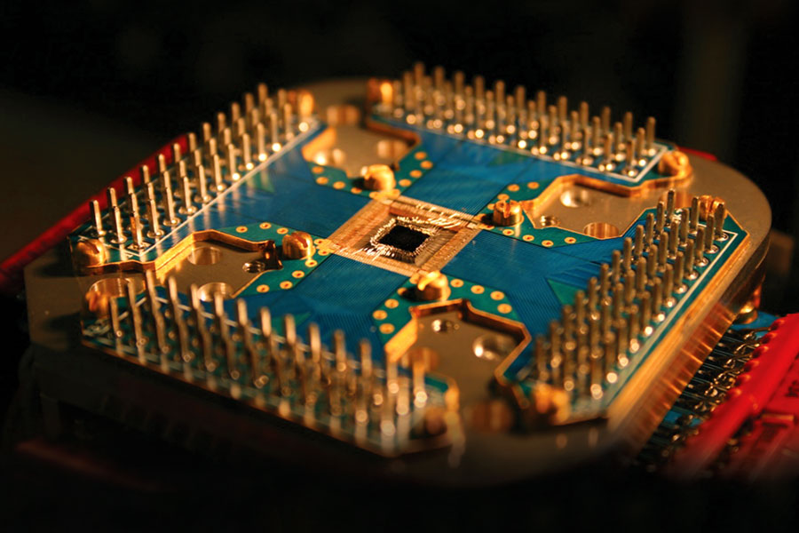 
       Adiabatic quantum processor chip mounted in cryogenic chip carrier and ready to use.
    