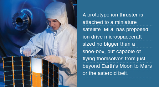 A prototype ion thruster is attached to a miniature satellite. MDL has proposed ion drive microspacecraft sized no bigger than a shoe-box, but capable of flying themselves from just beyond Earth’s Moon to Mars or the asteroid belt.