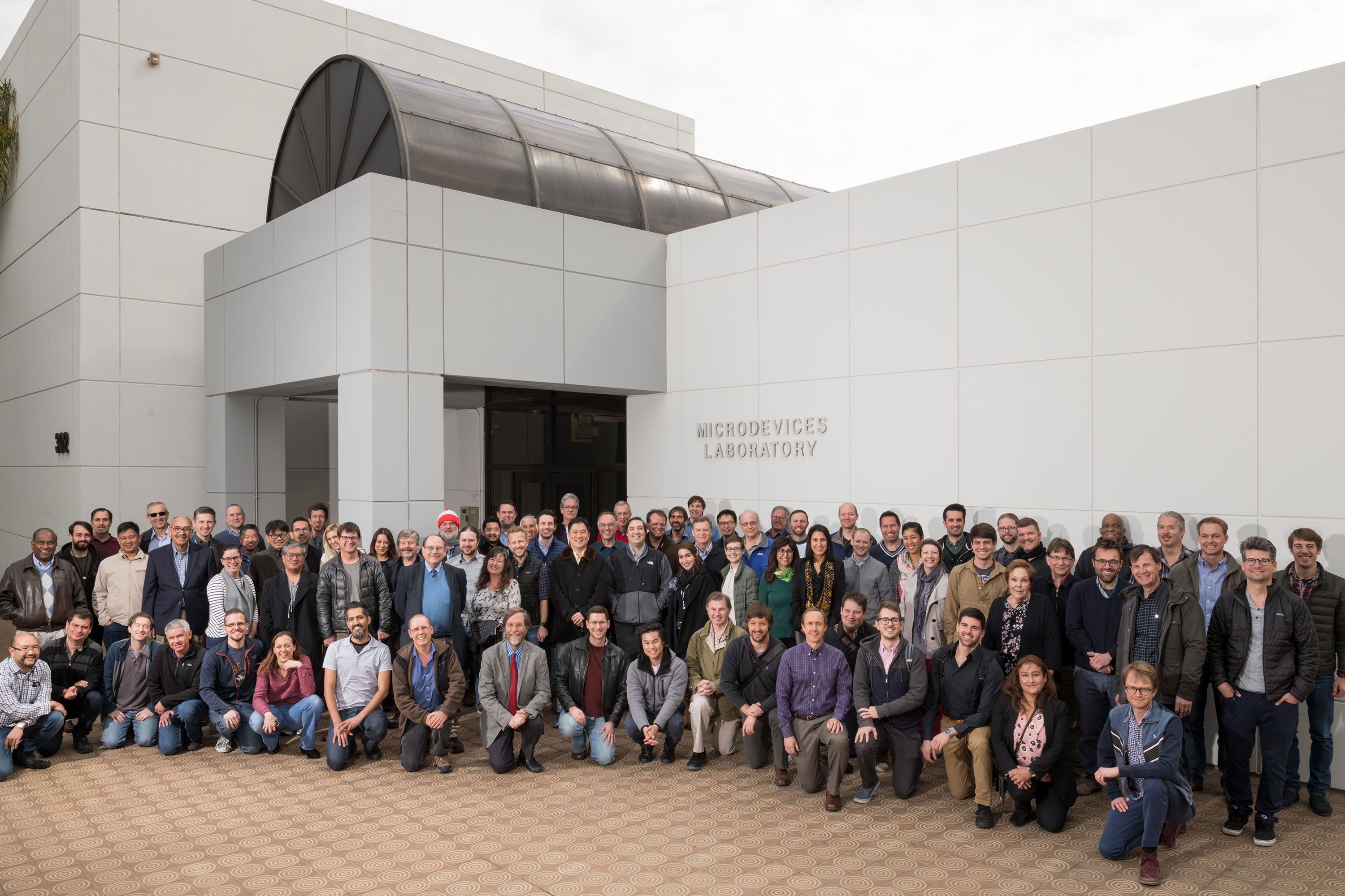 Group photo outside the Microdevices Laboratory building